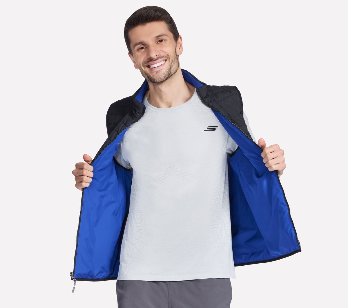 GO SHIELD Cozy Fit Altitude Reversible Vest | Skechers
